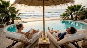 Couple relaxing poolside at luxury Morocco beach resort