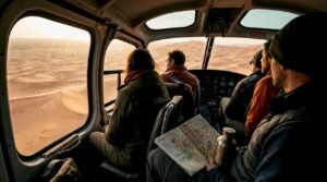 Travelers viewing Moroccan desert from helicopter window