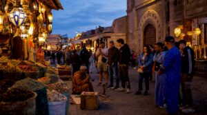 Bustling Marrakech market scene at sunset